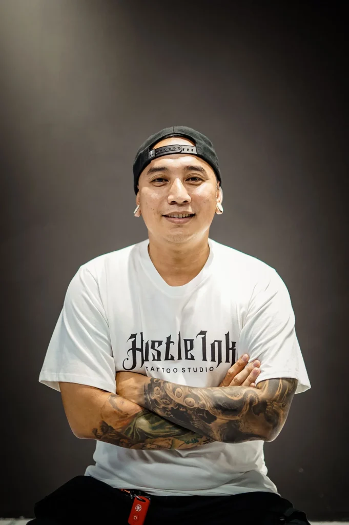 Goper award-winning blackwork tattoo artist Hustle Ink Legian Bali